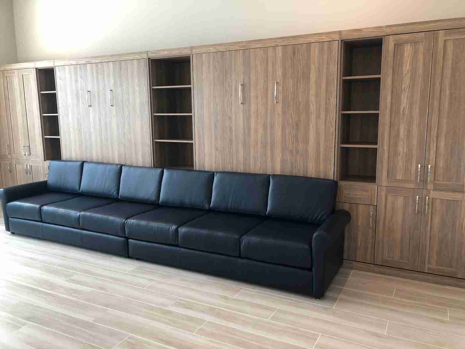 Double queen wall beds with custom sofa