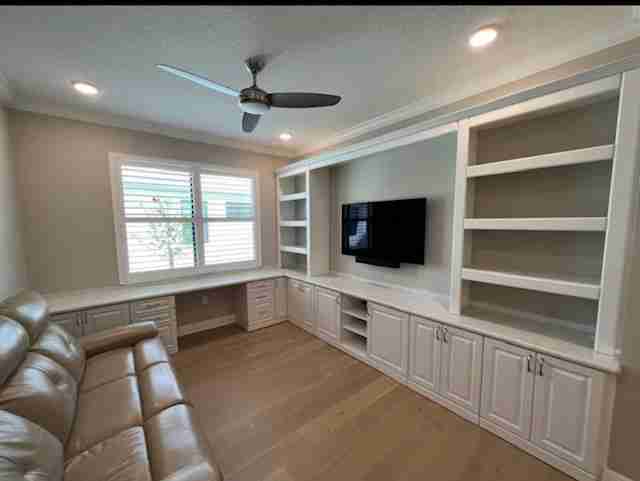 Media center with desk storage