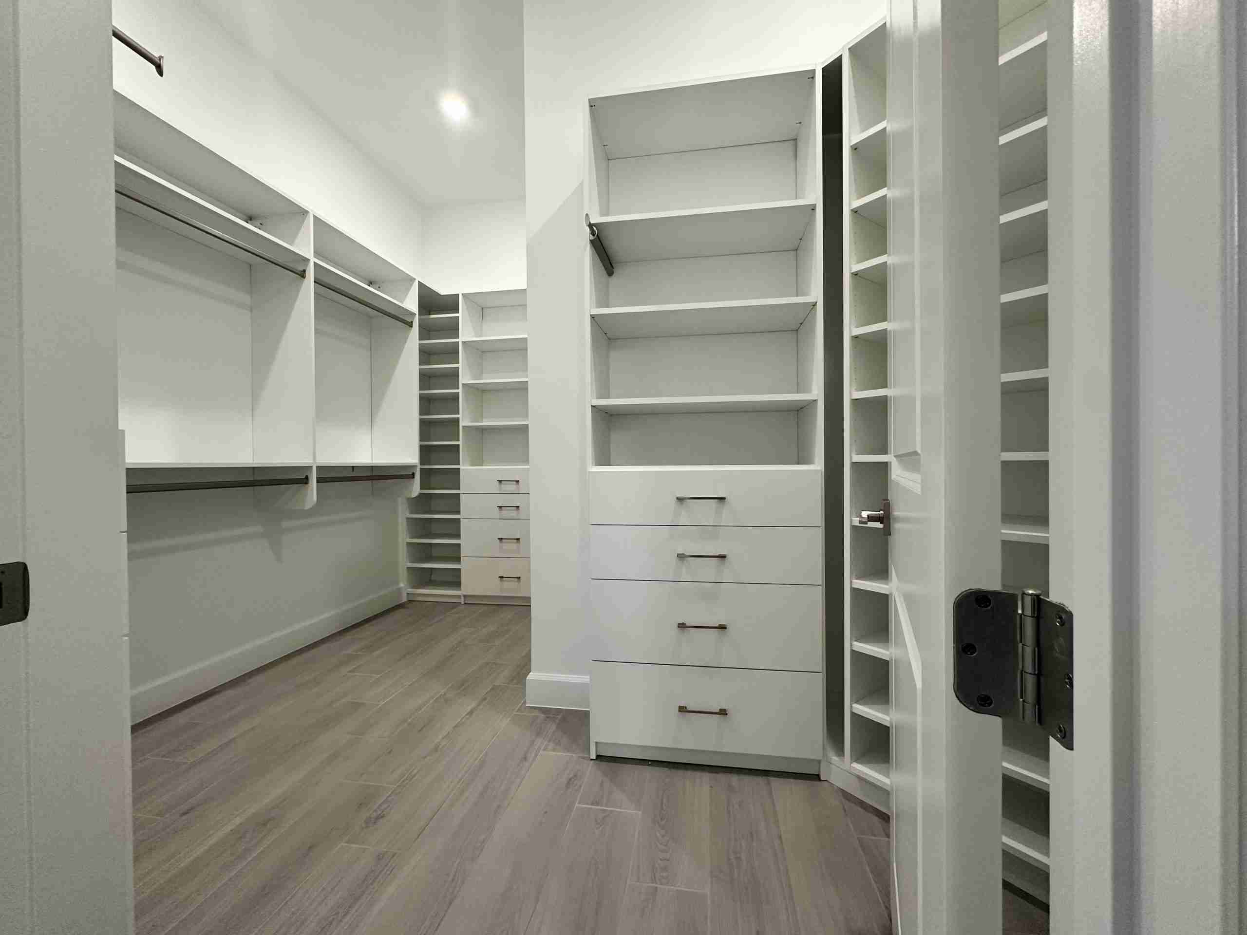 White contemporary walk-in closet